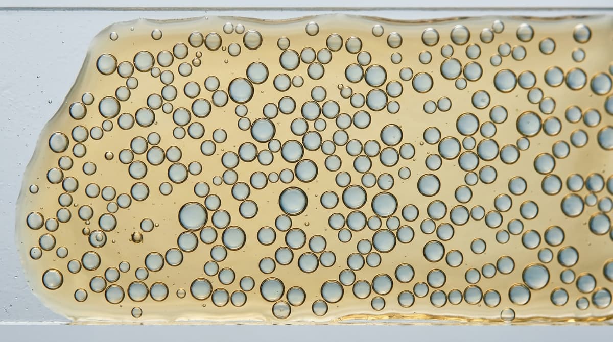 Diagram of a water-in-oil emulsion: water droplets in an oil phase